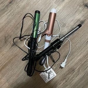 Three Conair hair curlers